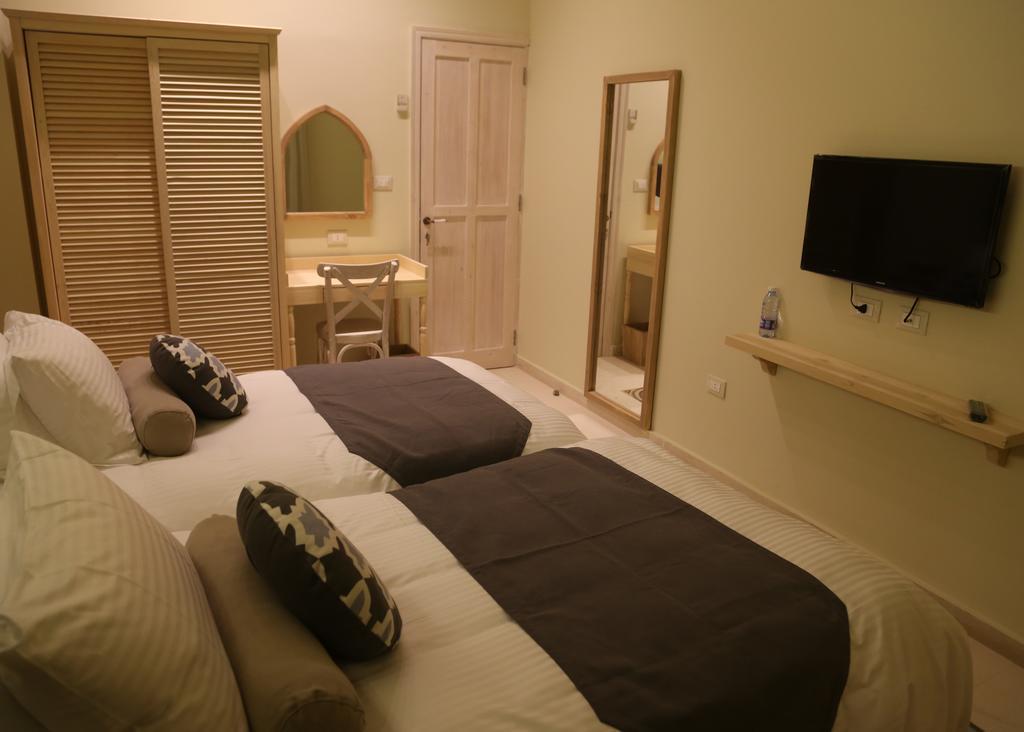 Hotel Dar Alma Tiro Habitación foto